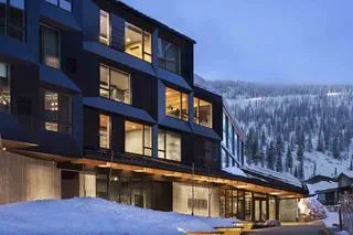 humbird hotel exterior at night at schweitzer mountain