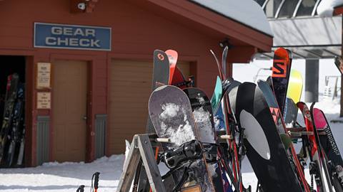 snowboard and skis rentals stored outside gear check at schweitzer mountain ski locker rentals 
