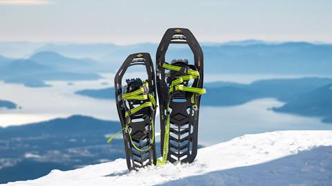 snowshoes sticking in the snow used for snowshoeing at schweitzer