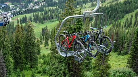 Mountain bikes loaded on a chairlift at Schweitzer Mountain.