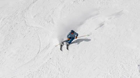 skier carving on performance ski rentals at schweitzer mountain