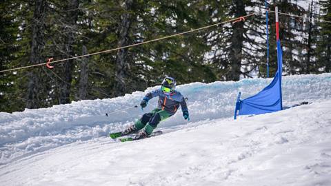 skier going through banked slalom course at Schweiter