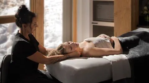 woman getting massage at Cambium Spa