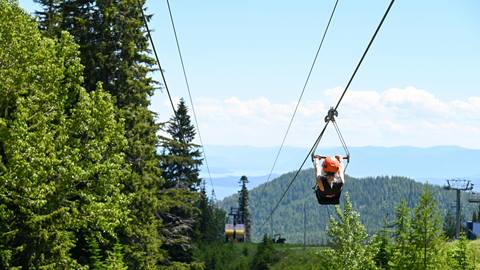 kid ziplining at Schweitzer